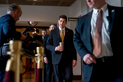 (AP Photo/Andrew Harnik). House Speaker Paul Ryan of Wis., center, walks to the Capitol Building from the Capitol Visitor's Center, Thursday, Jan. 18, 2018, in Washington.