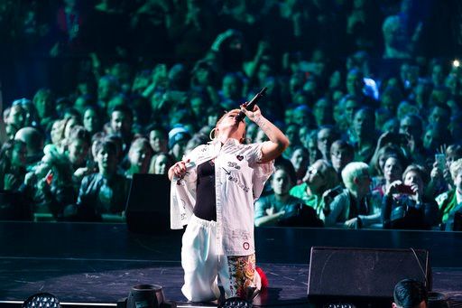 (Photo by Michael Zorn/Invision/AP). Pink performs at The Armory on Friday, Feb. 2, 2018, in Minneapolis.