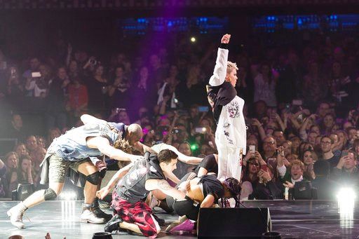 (Photo by Michael Zorn/Invision/AP). Pink performs at The Armory on Friday, Feb. 2, 2018, in Minneapolis.