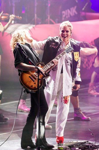 (Photo by Michael Zorn/Invision/AP). Pink performs at The Armory on Friday, Feb. 2, 2018, in Minneapolis.