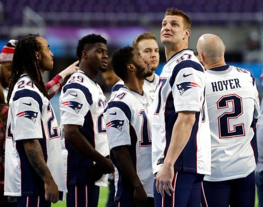 (AP Photo/Mark Humphrey). New England Patriots tight end Rob Gronkowski (87) looks around U.S. Bank Stadium before the team photo is made Saturday, Feb. 3, 2018, in Minneapolis.