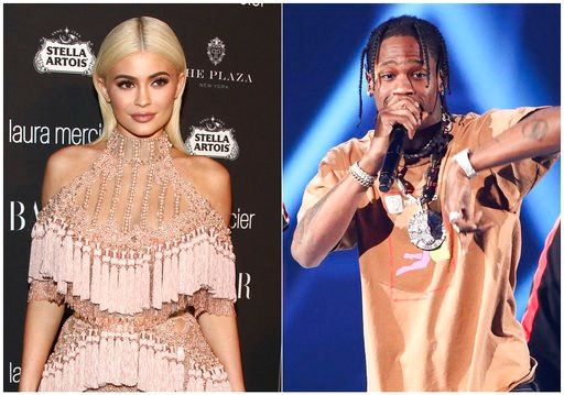 (Photos by Andy Kropa, left, and John Salangsang/Invision/AP). In this combination photo, TV personality Kylie Jenner, left, attends Harper's Bazaar Icons celebration on Sept. 9, 2016, in New York and rapper Travis Scott performs at the 2017 iHeartRadi...