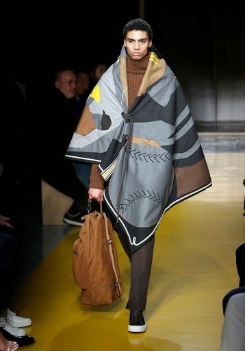 (AP Photo/Seth Wenig). A model walks the runway at a Hugo Boss fashion show during Fashion Week in New York, Wednesday, Feb. 7, 2018.
