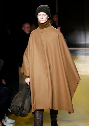 (AP Photo/Seth Wenig). A model walks the runway at a Hugo Boss fashion show during Fashion Week in New York, Wednesday, Feb. 7, 2018.