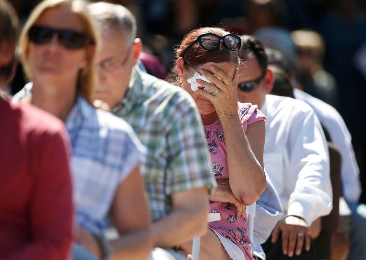 Attendees react at a prayer vigil for the victims of the shooting at Marjory Stoneman Douglas High School. (Source: AP Photo/Wilfredo Lee)