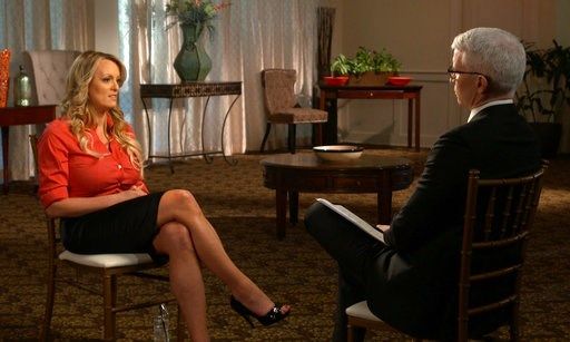 (CBS News/60 Minutes via AP). This image released by CBS News shows Stormy Daniels, left, during an interview with Anderson Cooper which will air on Sunday, March 25, 2018, on "60 Minutes."