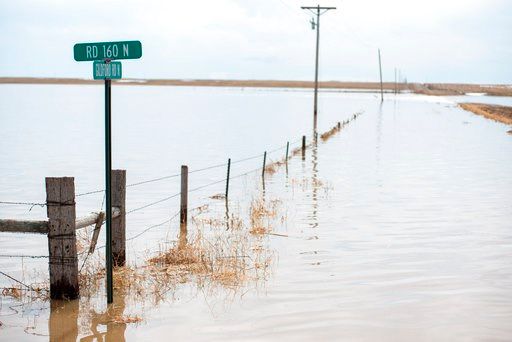 (Ryan Welch/Havre Daily News via AP). A pasture lays submerged under five to 15 feet of water at the Gildford Colony north of Gildford, Mont. The area saw most of the water form over the weekend. A bad mix of warm weather and large amounts of yet to me...