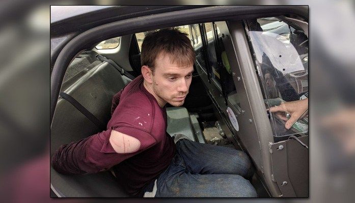 Travis Reinking was arrested in a wooded area in Nashville, one day after killing four people and injuring four others at a Waffle House. (Source: NASHVILLE POLICE/TWITTER)