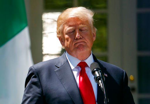 (AP Photo/Carolyn Kaster). President Donald Trump pauses during a during a news conference with Nigerian President Muhammadu Buhari in the Rose Garden of the White House in Washington, Monday, April 30, 2018.