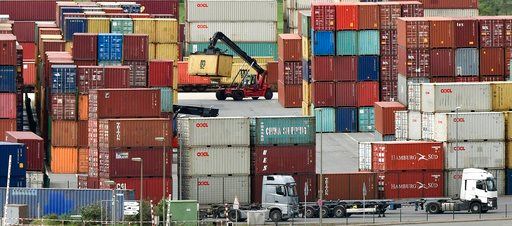 (AP Photo/Martin Meissner). Containers are stored for export at a harbor in Duisburg, Germany, Monday, April 30, 2018.