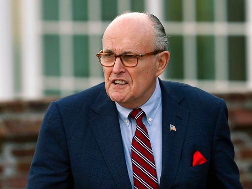 (AP Photo/Carolyn Kaster, File). FILE - In this Nov. 20, 2016 file photo, former New York Mayor Rudy Giuliani arrives at the Trump National Golf Club Bedminster clubhouse in Bedminster, N.J. President Donald Trump's new lawyer Rudy Giuliani said Wednes...