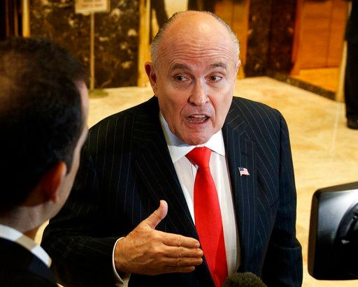 (AP Photo/Evan Vucci, File). FILE - In this Jan. 12, 2017, file photo, former New York City Mayor Rudy Giuliani talks with reporters in the lobby of Trump Tower in New York. Giuliani's revelation that U.S. President Donald Trump reimbursed his personal...