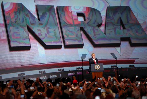 (AP Photo/Mike Stewart File). FILE - In this April 28, 2017 file photo, President Donald Trump speaks during the National Rifle Association-ILA Leadership Forum, in Atlanta. As NRA prepares to gather for its 147th annual meeting in Dallas, the politica...