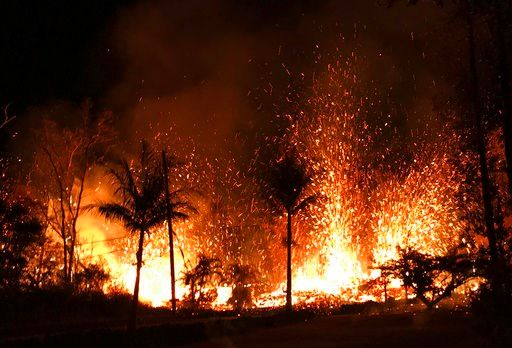 (U.S. Geological Survey via AP). In this Saturday, May 5, 2018 photo, a new fissure erupts in Leilani Estates in Pahoa, Hawaii. Hawaii's erupting Kilauea volcano has destroyed homes and forced the evacuations of more than a thousand people.