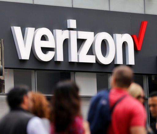 (AP Photo/Bebeto Matthews, File). In this Tuesday, May 2, 2017, file photo, Verizon corporate signage is captured on a store in Manhattan's Midtown area, in New York.