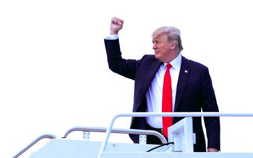 (AP Photo/Susan Walsh). President Donald Trump walks up the steps of Air Force One at Andrews Air Force Base in Md., Wednesday, June 20, 2018. Trump is heading to Duluth, Minn., to speak at a rally for Pete Stauber, a Republican congressional candidate...
