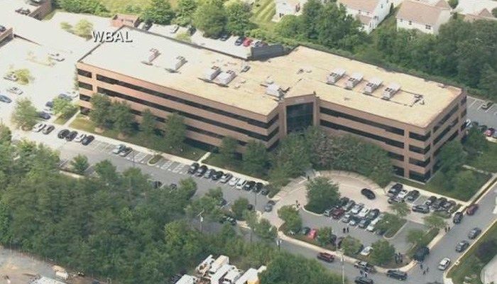 The gunman shot through the glass door to the office and opened fire on multiple employees. (Source: WBAL/CNN)