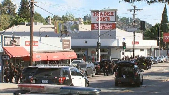 Law enforcement surrounded the building and had weapons pointed at the store. (Source: KABC/CNN)
