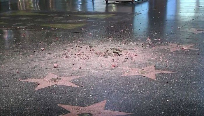 The star was reportedly destroyed by a pick axe. (Source: AP Photo/Damian Dovarganes)