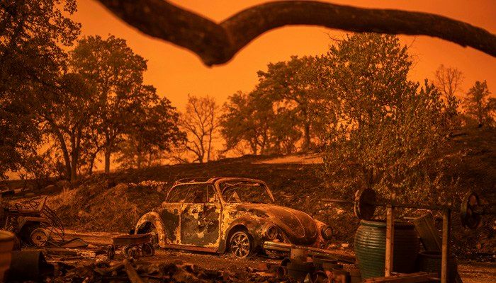 With more than 1,100 structures leveled, the Carr fire is now California’s seventh-most destructive fire ever. (Source: AP Photo/Noah Berger)