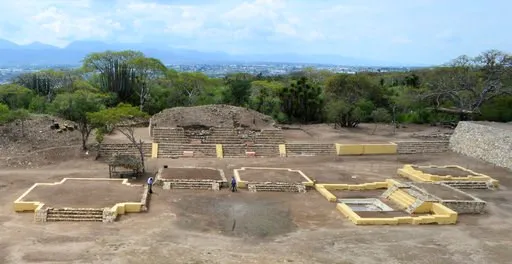 (Meliton Tapia Davila/INAH via AP). In this 2018 photo provided by Mexico's National Institute of Anthropology and History, INAH, investigators work at the Ndachjian–Tehuacan archaeological site in Tehuacan, Puebla state, Mexico, where archaeologist ha...
