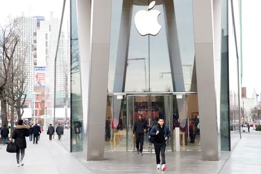 (AP Photo/Mary Altaffer). Customers leave the Apple store in the Brooklyn borough of New York, Thursday, Jan. 3, 2019. Apple's shock warning that its Chinese sales are weakening ratcheted up concerns about the world's second largest economy and weighed...